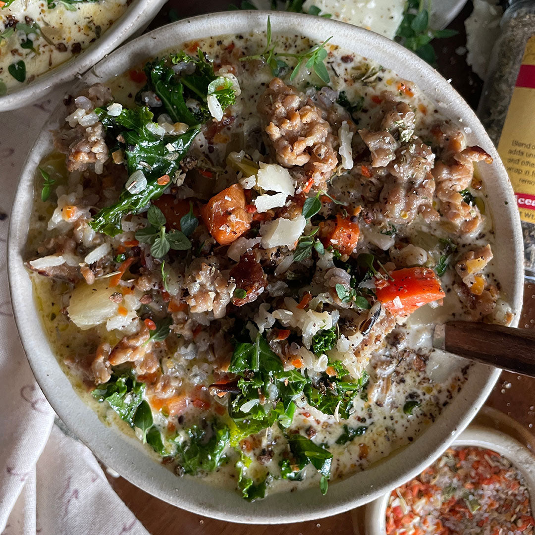 bowl of soup with vegetables and meat